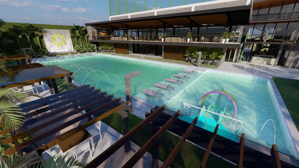 A modern outdoor resort pool area shown in a rendered architectural visualization, featuring a large turquoise swimming pool, lounge chairs in the water, pergolas, greenery, and a contemporary building with balconies and glass railings. Colorful ring-shaped pool decor appears near the water; any text is unrecognizable.