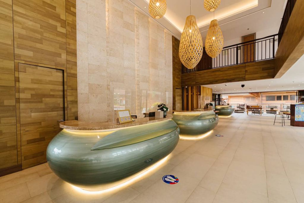 Modala Beach Resort reception lobby with pendant lighting